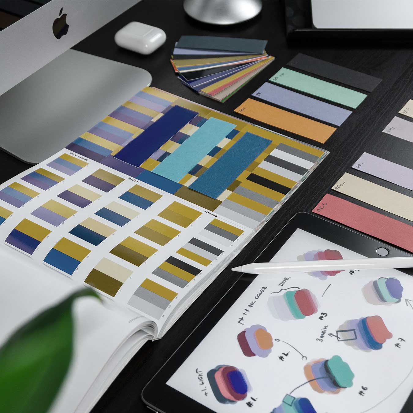 Brand identity design workspace with colour palettes and creative visual concepts for B2B branding