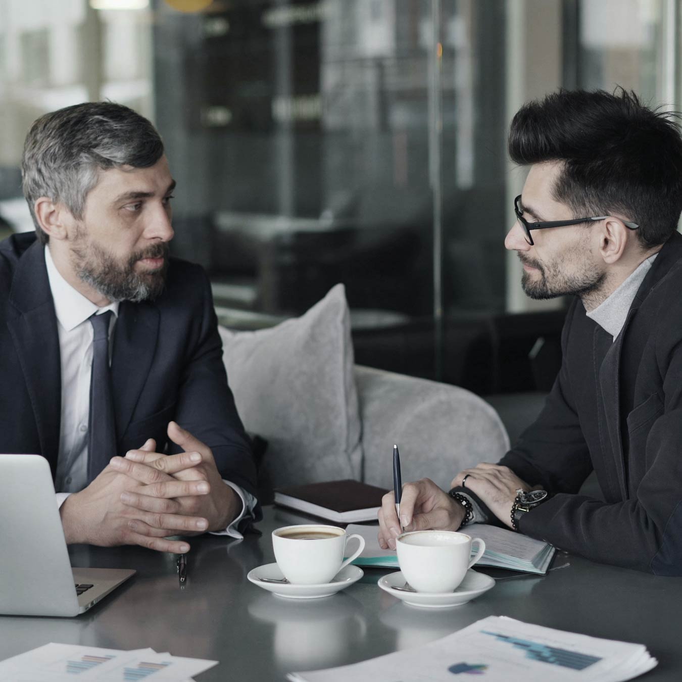 B2B client strategy meeting discussing integrated marketing and business growth